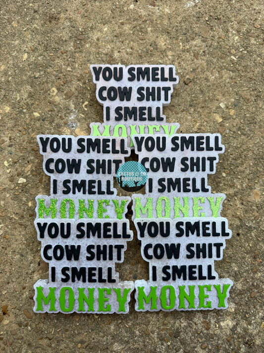 You smell cow shit i smell money