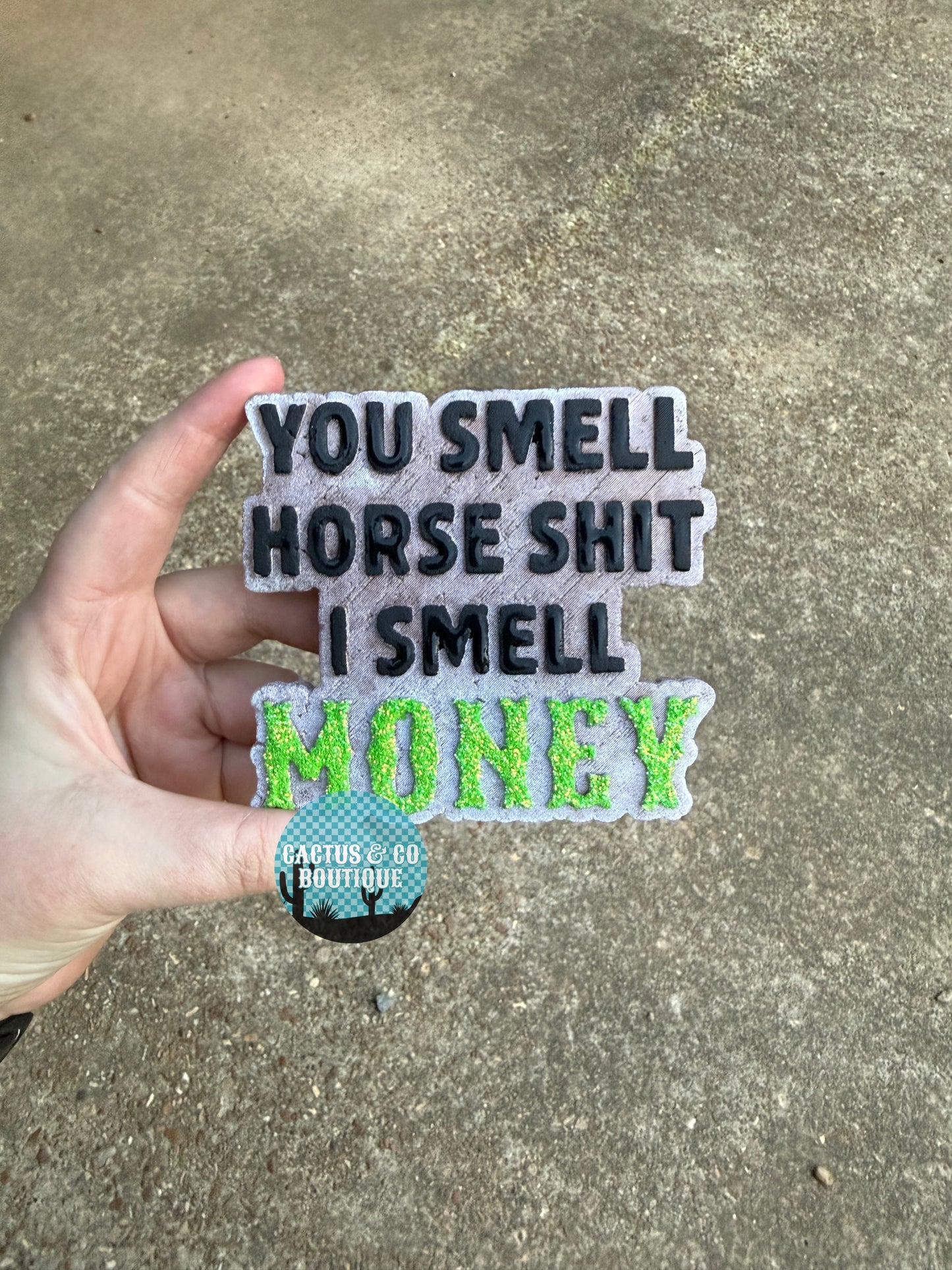 You smell horse shit i smell money